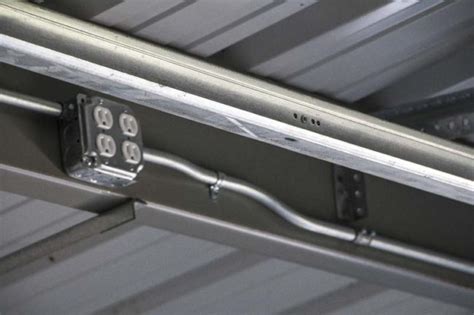 metal bracket to attach conduit to i-beam|running electrical wires along metal beam.